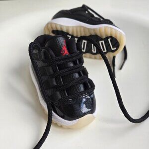 4C Toddler Air Jordan 11 Retro Low black white sneaker Nike EUC kids baby